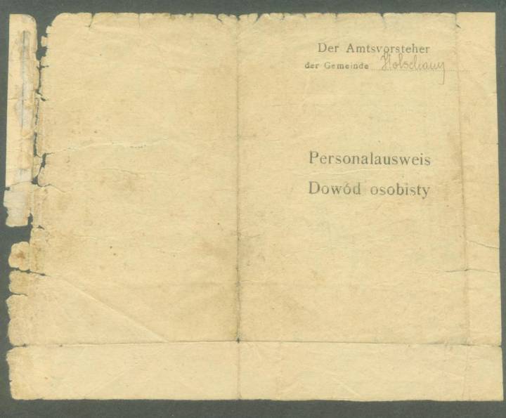 Dwujęzyczny dowód osobisty wydawany przez władze niemieckie w czasie okupacji - część  tytułowa.