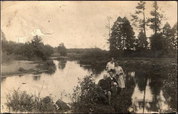 Konstancin Niezabytowski, wife Magdalena, daughter and friend,  with 2 dogs along Wilya river on their estate, Karolin.  The river was the Polish-Russian border at the time.  Photo 1/2. During the night of September 16/17, 1939 when the Soviet Army crossed the border, K. Niezabytowski was wounded in a leg and taken away. From recently released documents; K. Niezabytowski was taken to the prison in Wilejka where he died before December 1939.  I believe his wife and children survived the war and am looking for more information about them.
