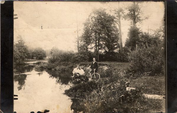Konstancin Niezabytowski, wife, Magdalena, daughter and friend,  with 2 dogs along Wilya river on their estate, Karolin.  The river was the Polish-Russian border at the time.  Photo 1/2. During the night of September 16/17, 1939 when the Soviet Army crossed the border, K. Niezabytowski was wounded in a leg and taken away. From recently released documents; K. Niezabytowski was taken to the prison in Wilejka where he died before December 1939.  I believe his wife and children survived the war and am looking for more information about them.